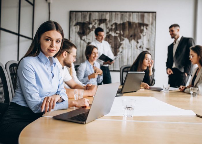 group-people-working-out-business-plan-office - LARGE